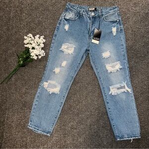 Distressed Blue Jeans